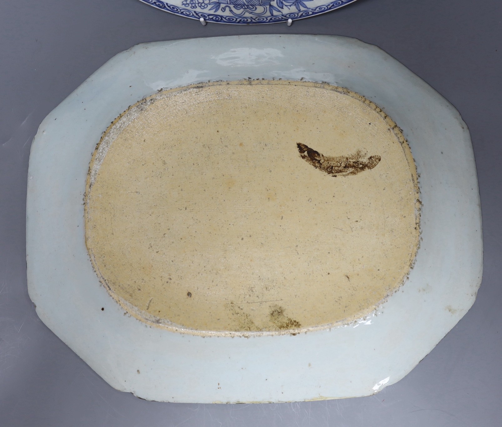 Three Chinese export blue and white dishes, 18th/19th century, largest 42cms wide